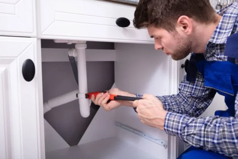 plumber-in-orange-county-repairing-the-plumbing-in-a-residential-property